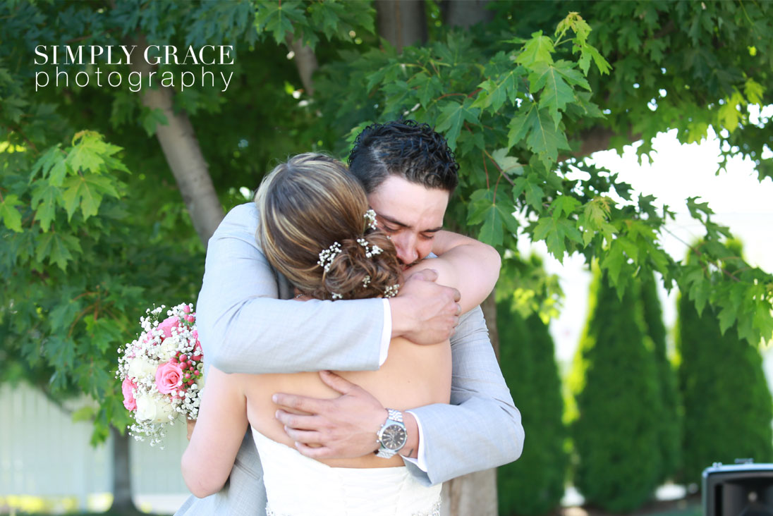 The Rhapsody Wedding first look photo by Simply Grace Photography