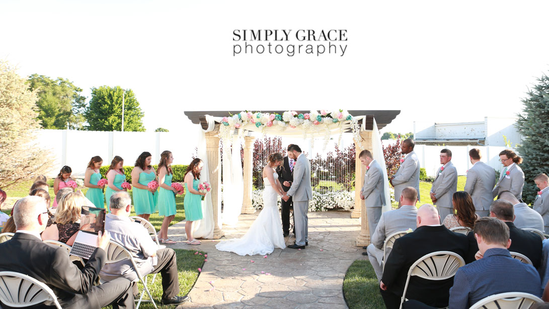 The Rhapsody Wedding ceremony photo by Simply Grace Photography