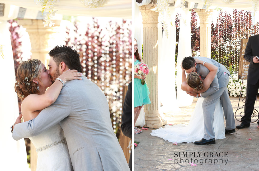 The Rhapsody Wedding kiss photo by Simply Grace Photography