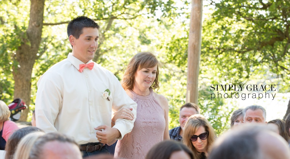 James P Davis Hall wedding ceremony signing photo by Simply Grace Photography