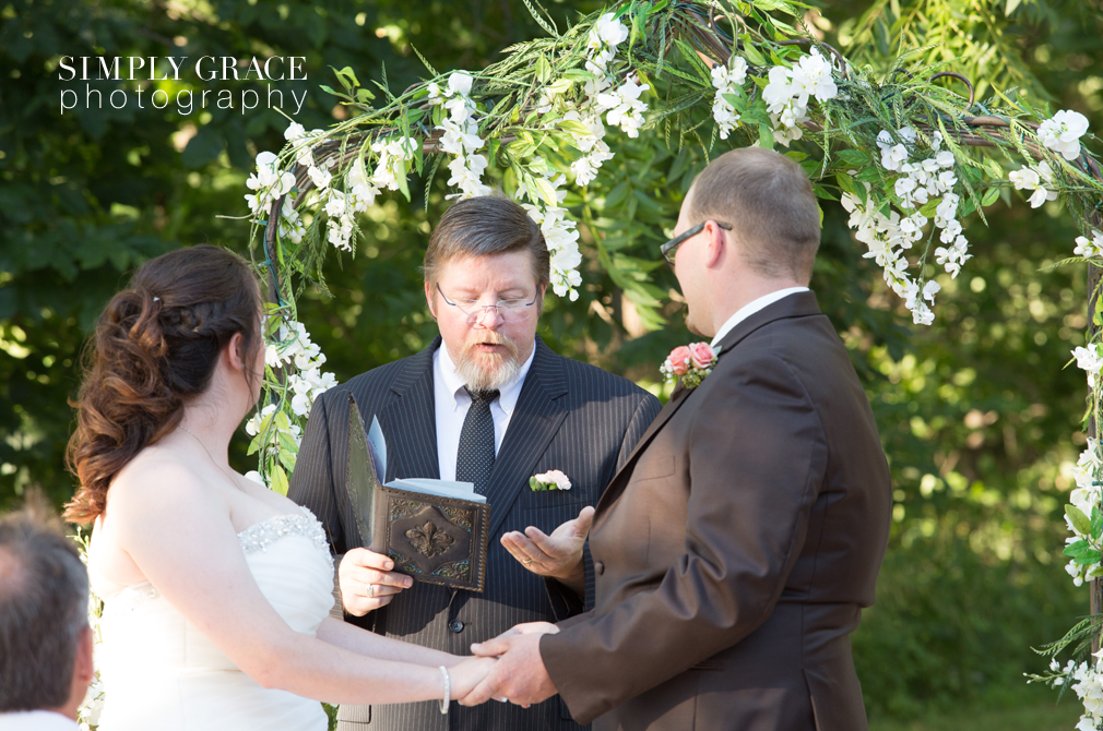 James P Davis Hall wedding ceremony photo by Simply Grace Photography