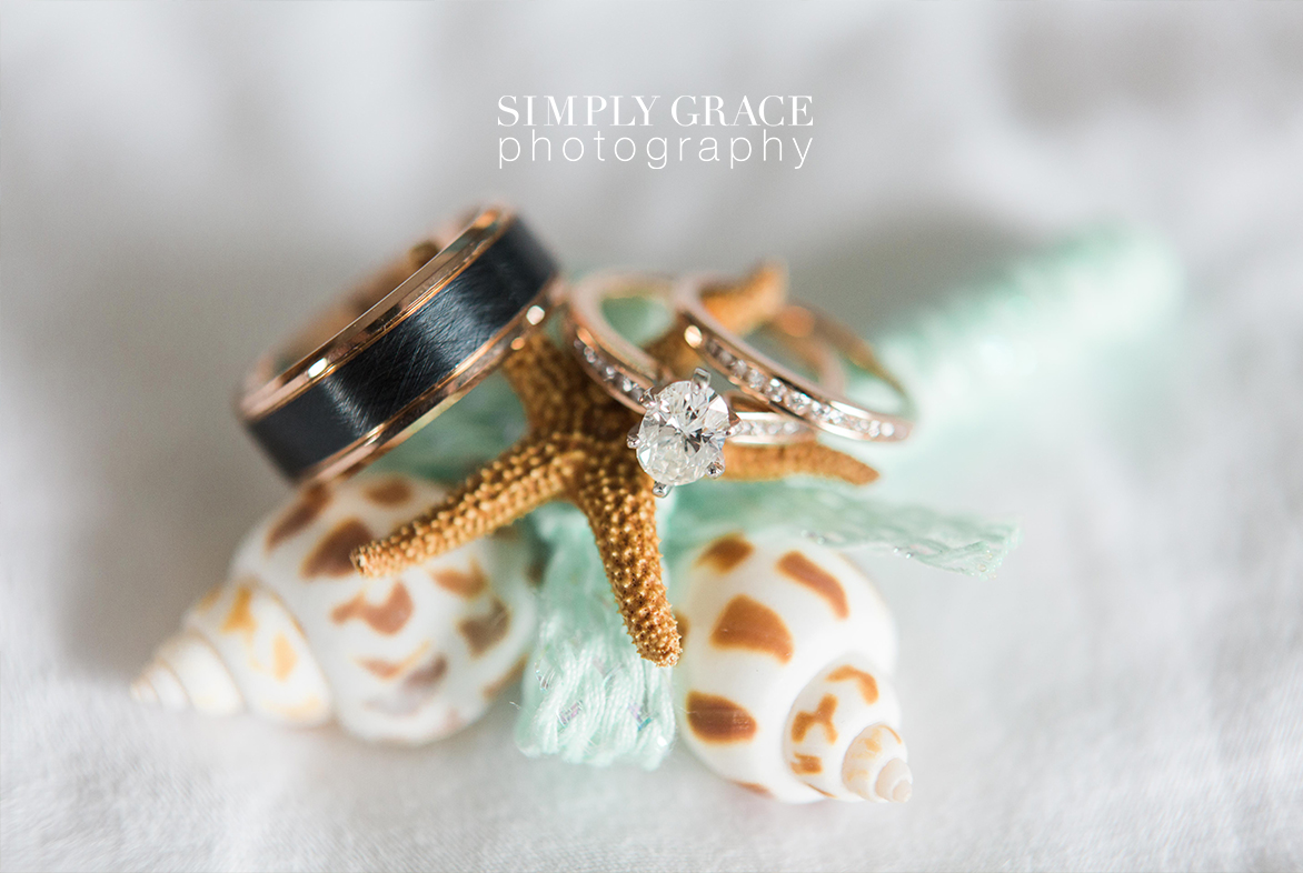 amelia-island-wedding-seashell-rings- simply-grace-photography