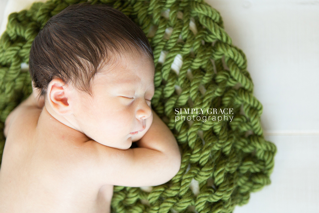 newborn photography on green blanket savannah simply grace photography
