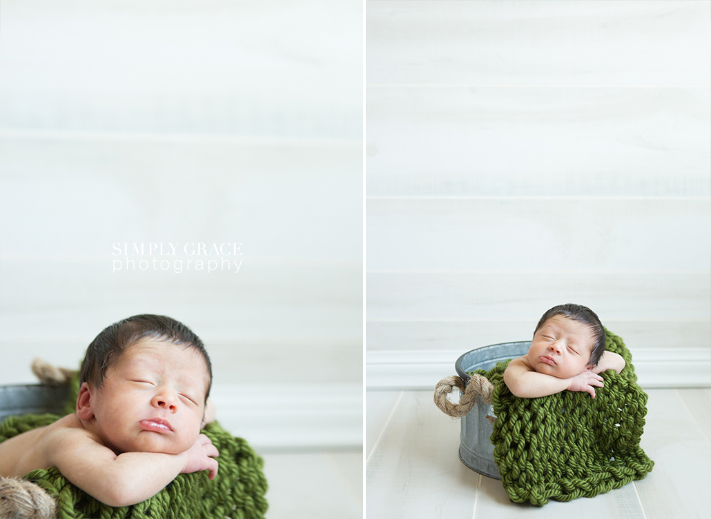 newborn in gray bucket green blanket savannah simply grace photography