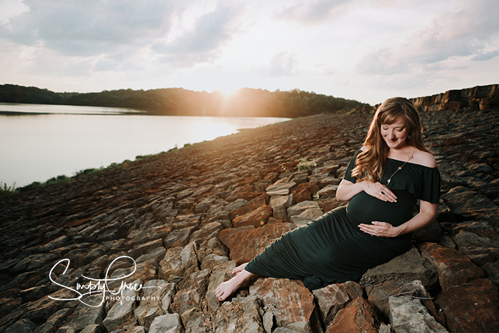 wyandotte county lake maternity session sunset damn green dress