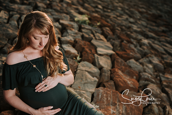 wyandotte county lake maternity session sunset green dress on damn