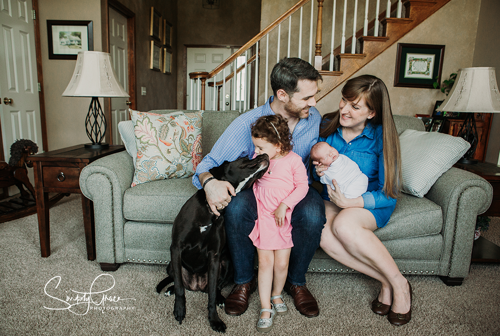 kansas city newborn photography family picture with dog in home simply grace photography