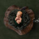 newborn boy green composite in wood bowl