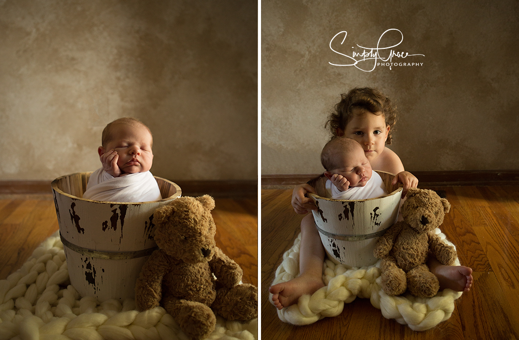 kansas city newborn photography baby in bucket next to sister