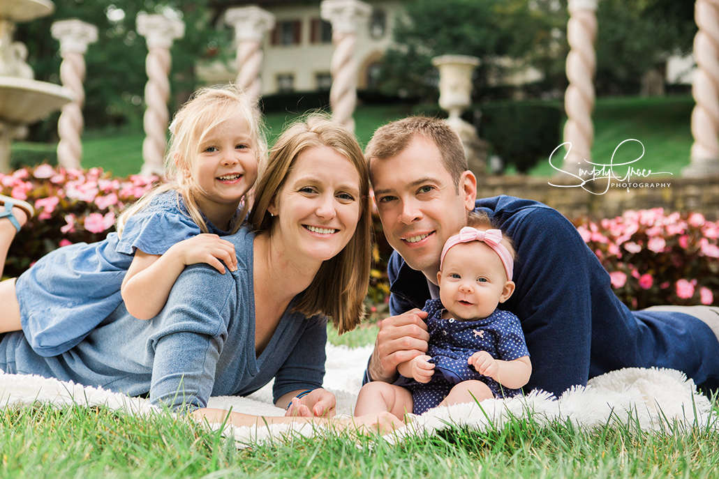 mission hills family session with simply grace photography family laying down