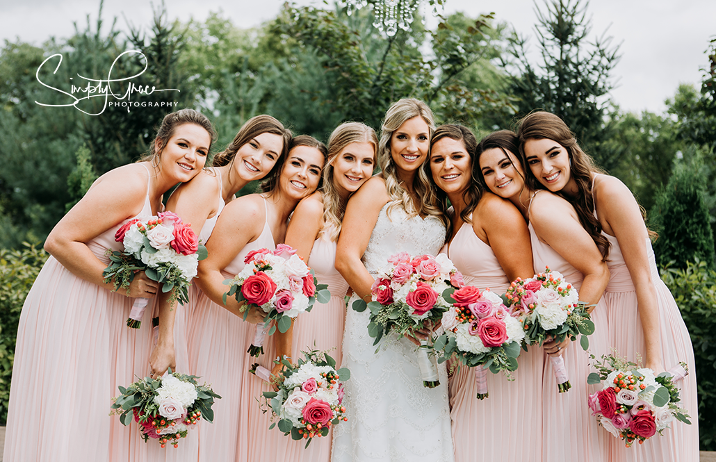 eighteen ninety wedding cute cuddle photo with bride simply grace photography