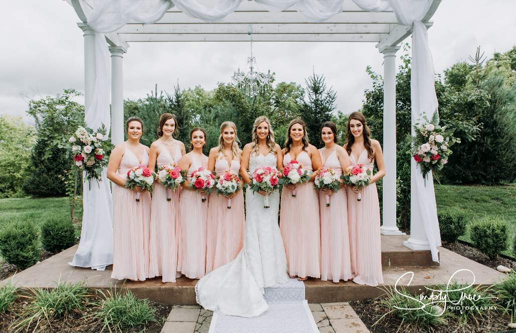 eighteen ninety wedding bridesmaids in pink dressed simply grace photography