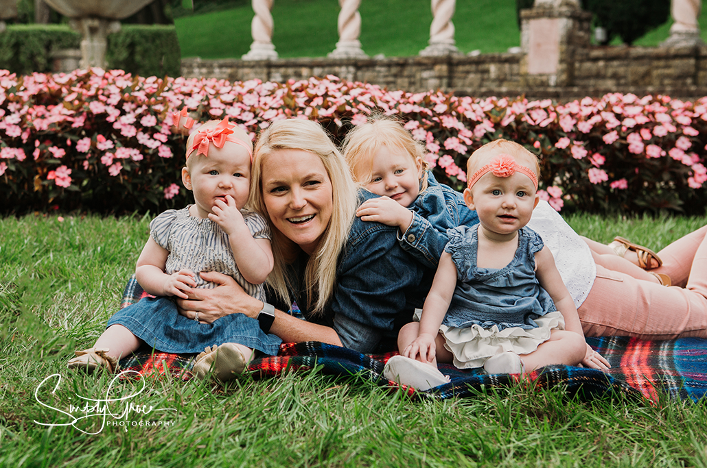 mom and her 3 babies during a photo session at verona columns in mission hills kansas city