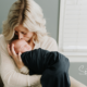 mom alone snuggling with baby in a newborn session simply grace photography