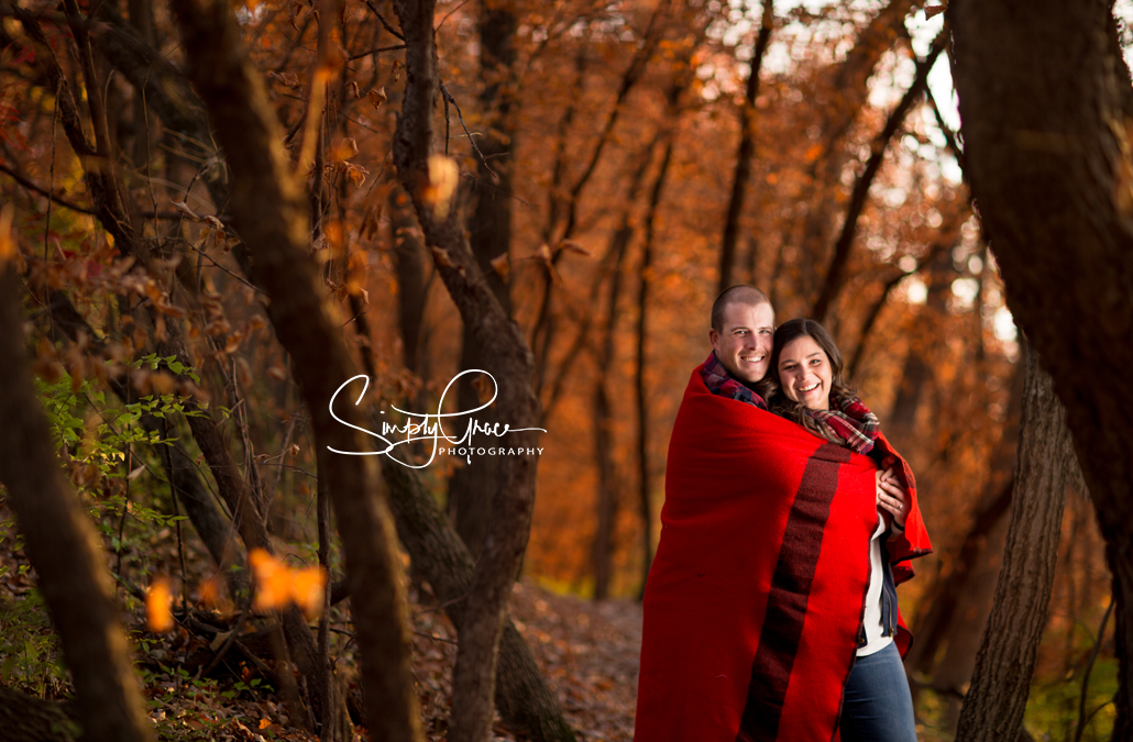 Wyandotte County Lake Engagement Session camping theme red wool blanket