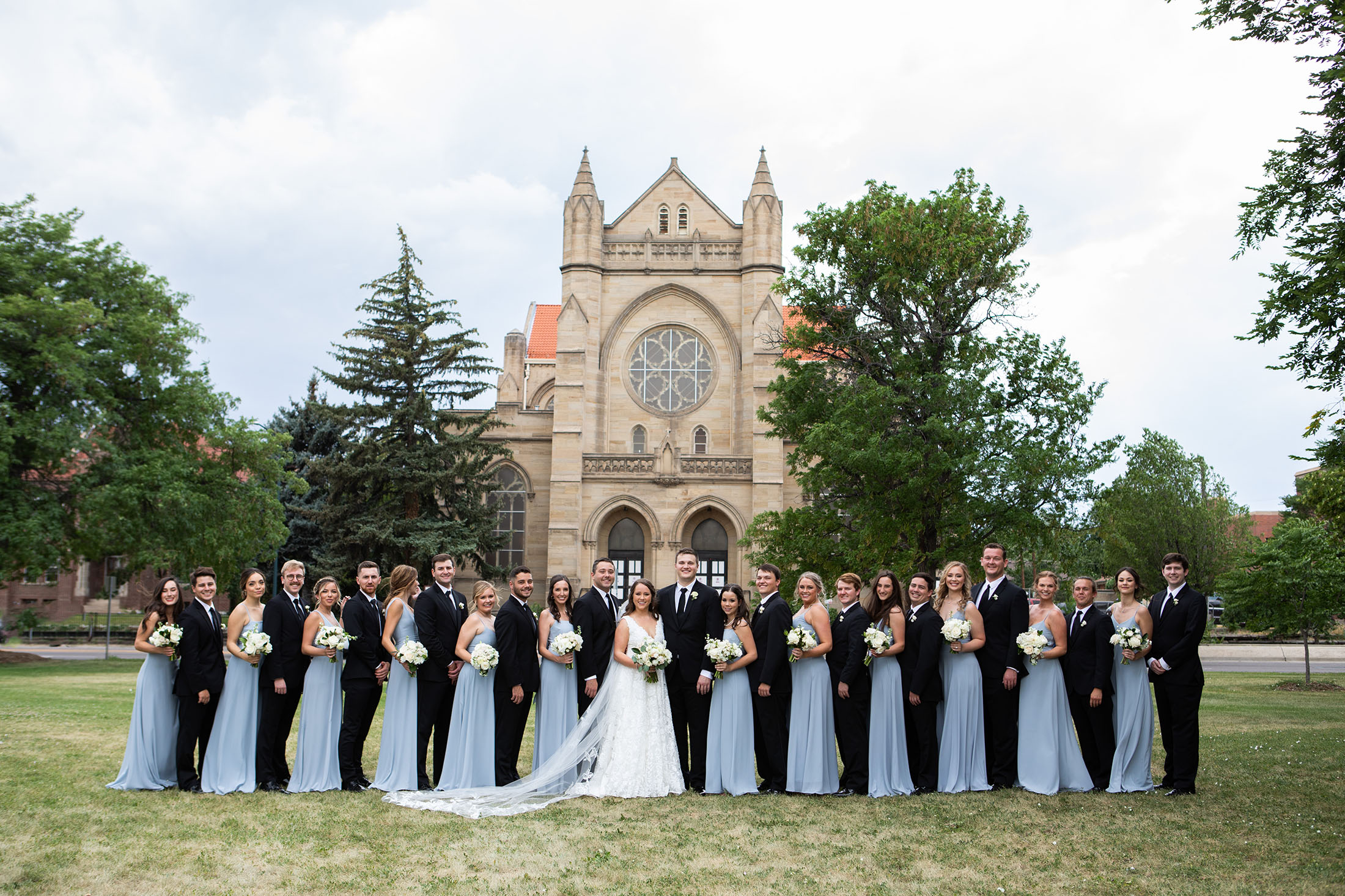 bridal party girls in dusty blue st dominic chapel