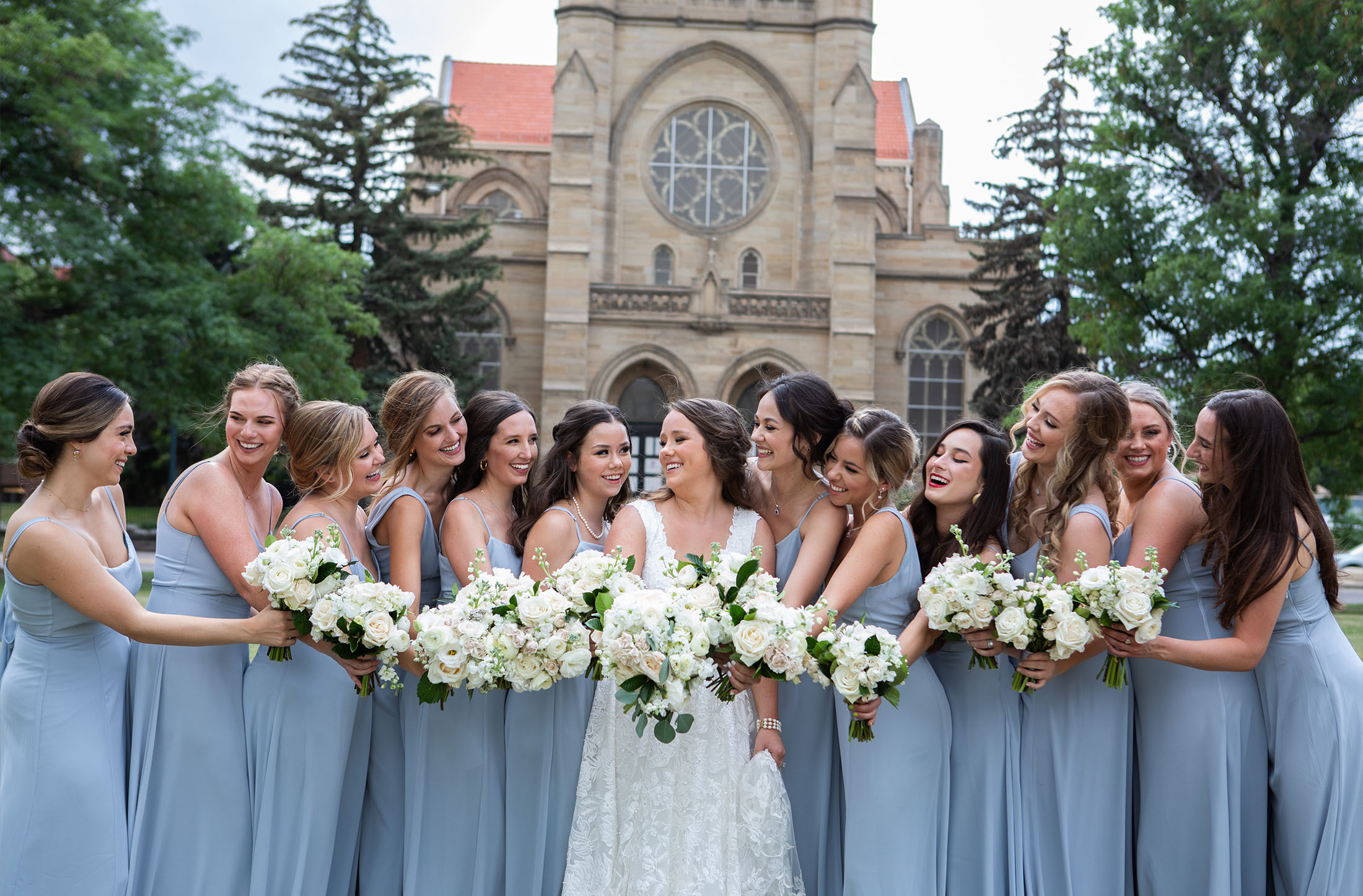 bridesmaids laughing at each other at st dominics chapel