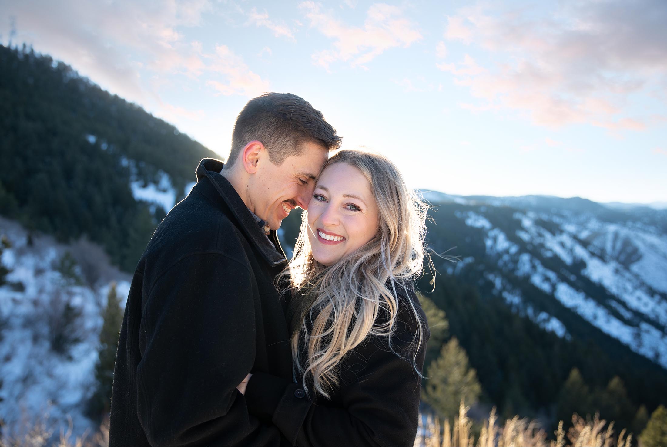 backlight of engagement couple on lookout mountain