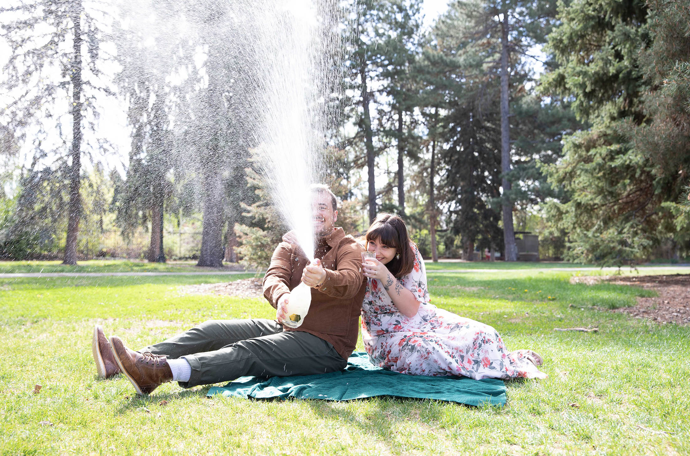 champagne toast explosion at cheeseman park with simply grace photography