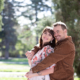 couple laughing with backlight during engagement session at cheeseman park