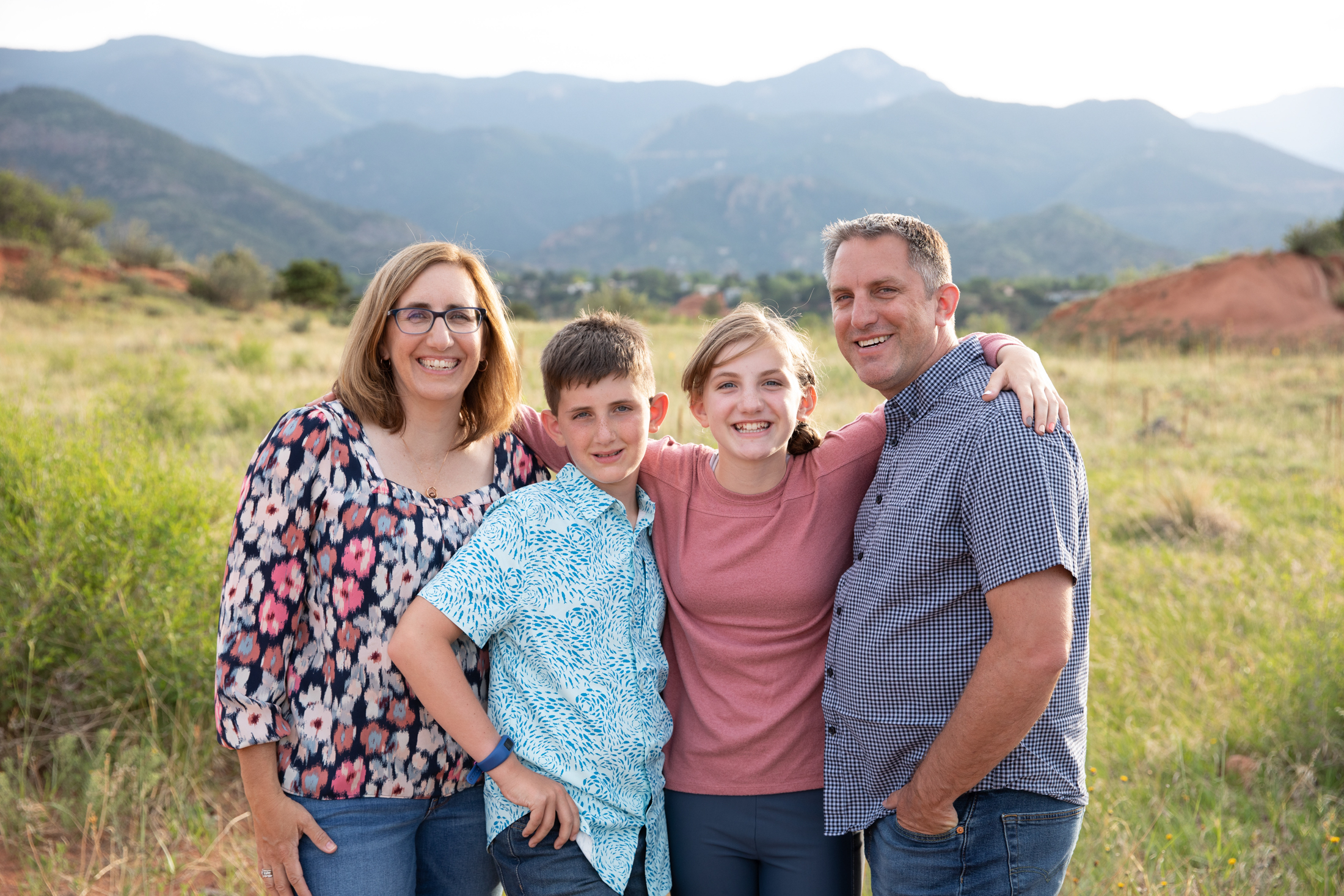 family poses in a group photo in colorado springs