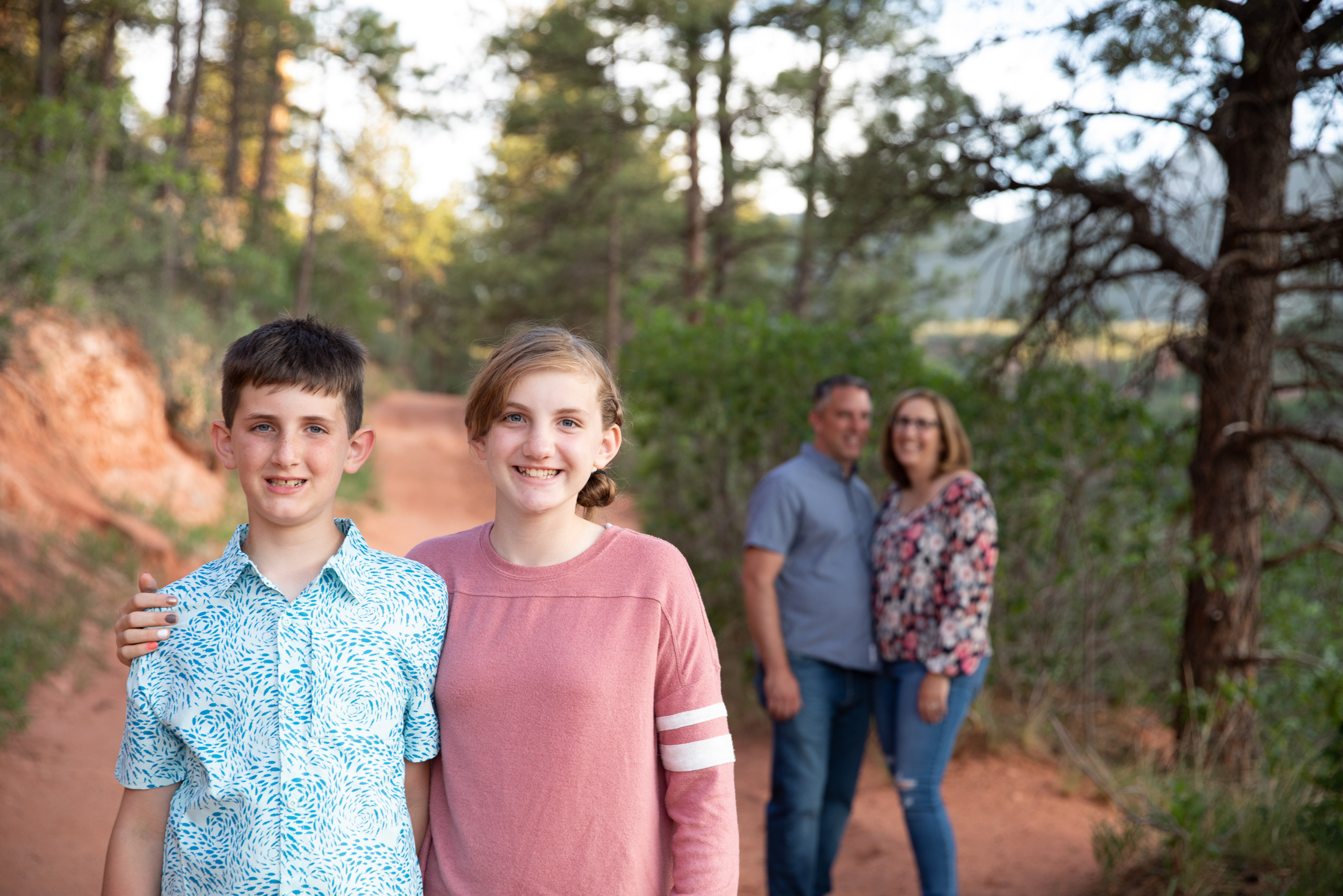 posed family session at red rocks open space with colorado springs