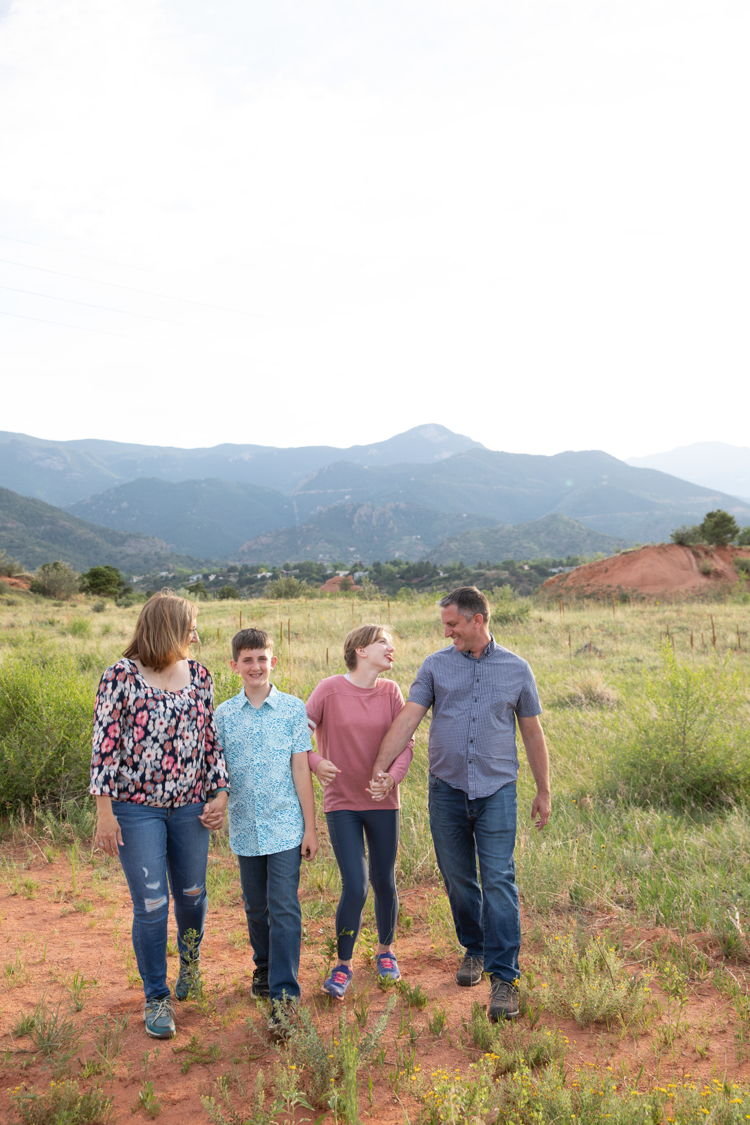 parents and kids walk during session at red rocks open space