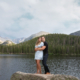 couple posing on rock at bear lake rocky mountain national park
