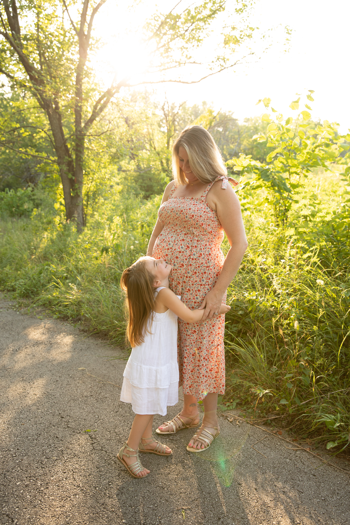 mommy and daughter during maternity session in lees summit
