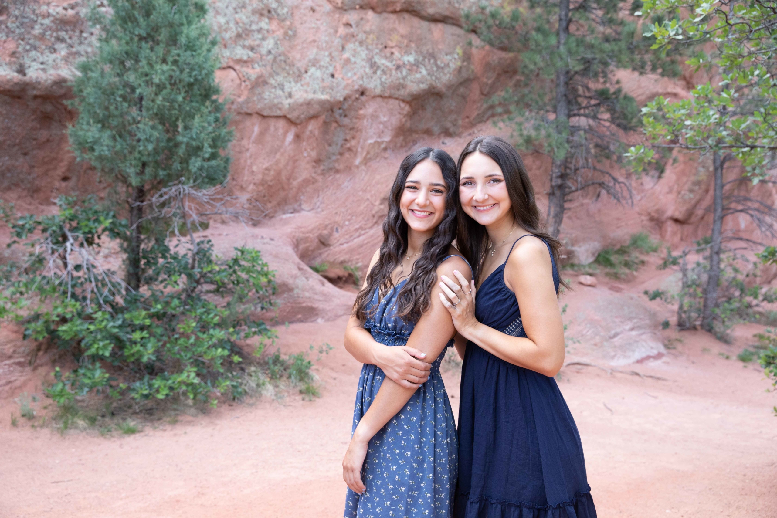 sisters in blue at red rocks open space family session