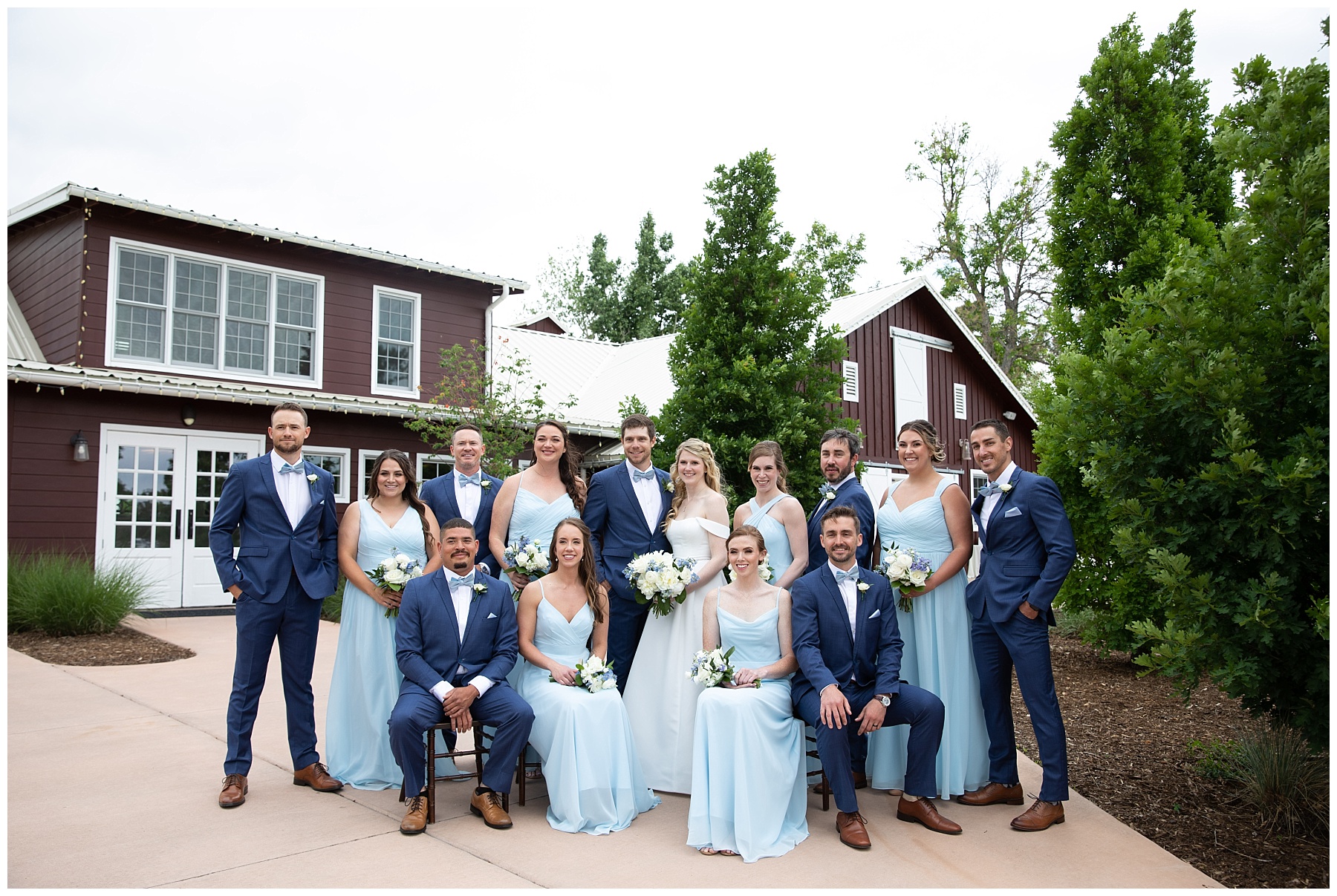 bridal party wearing blues at the barn at racoon creek