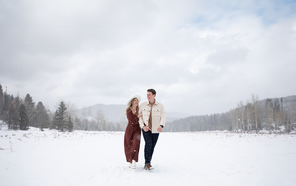 engagemtn session with a couple in a blizzard