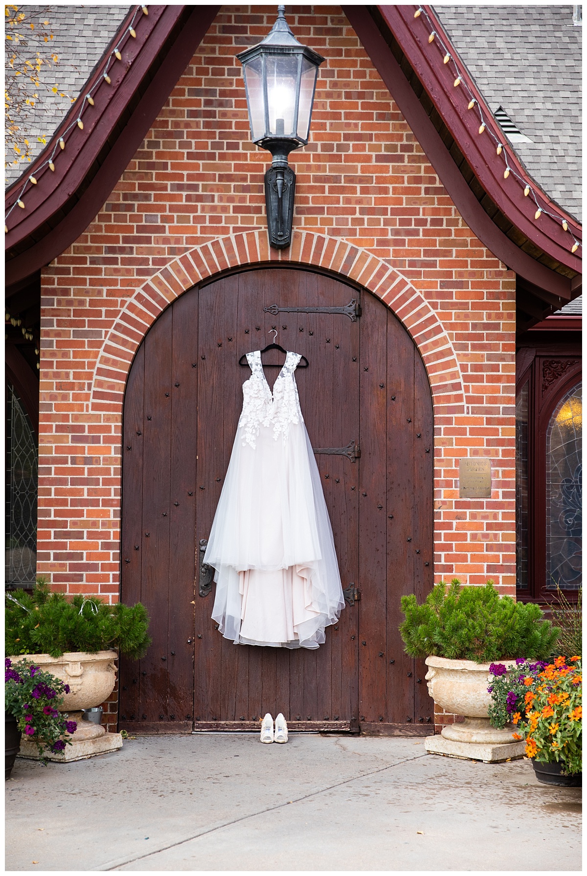 Wellshire event center wedding dress hanging on door