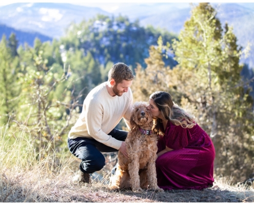 mount falcon engagement session kissing puppy dog