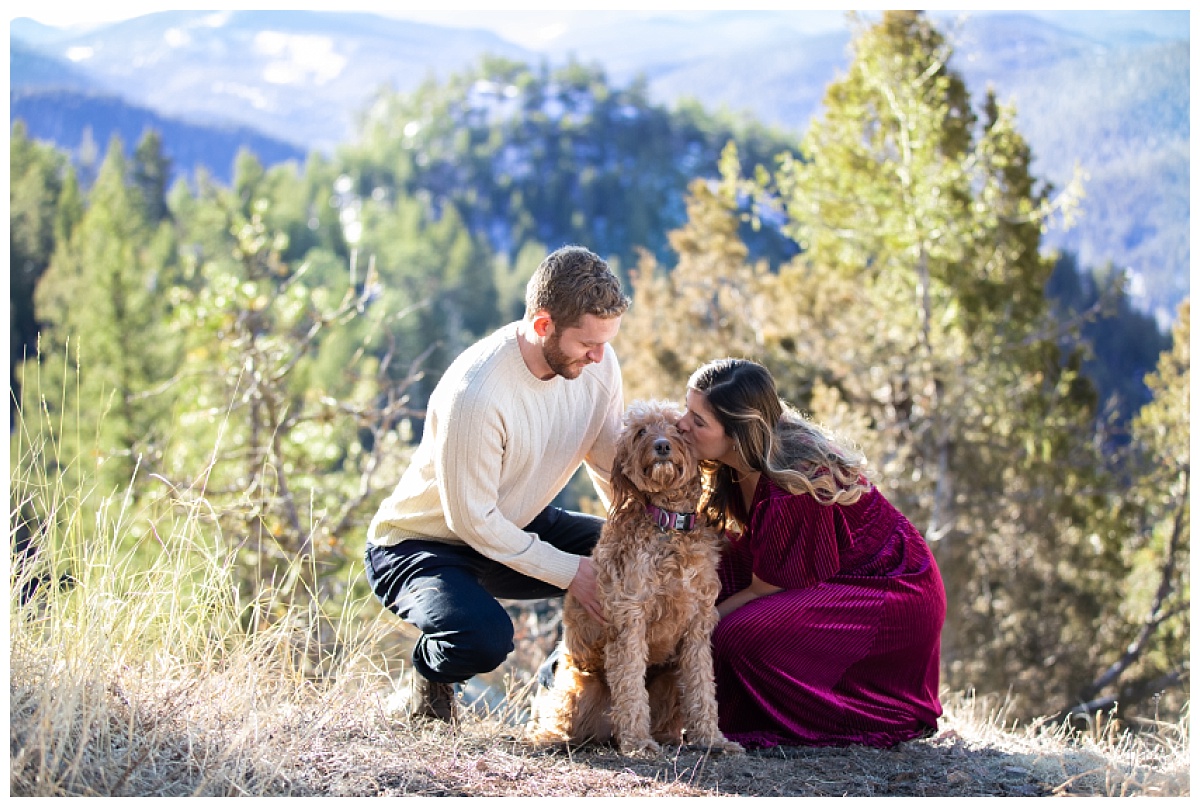 mount falcon engagement session kissing puppy dog