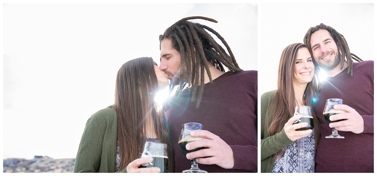 couple kissing outside of red leg brewery