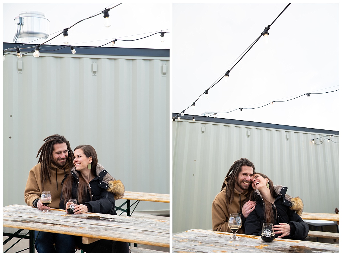 couple outside storage units for their engagement session