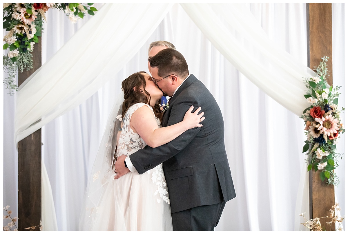 Wellshire event center wedding day kiss
