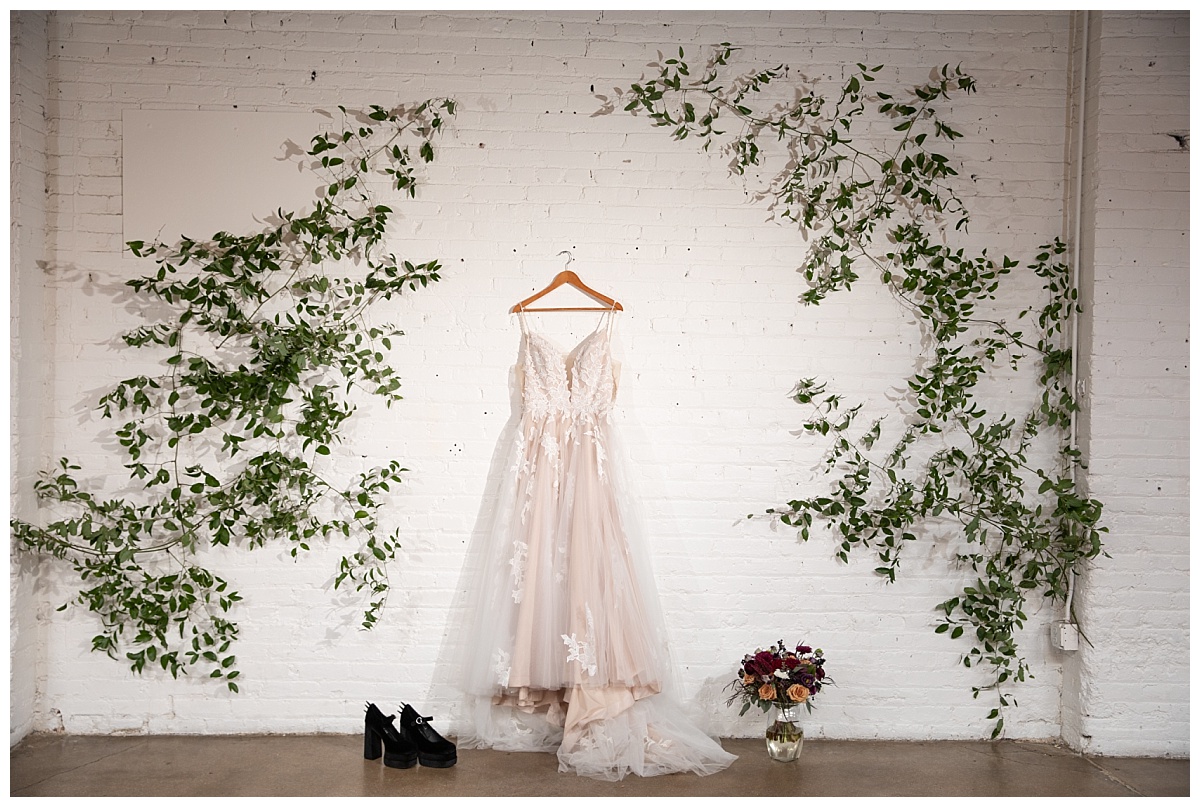 bridal dress hung up at the skylight