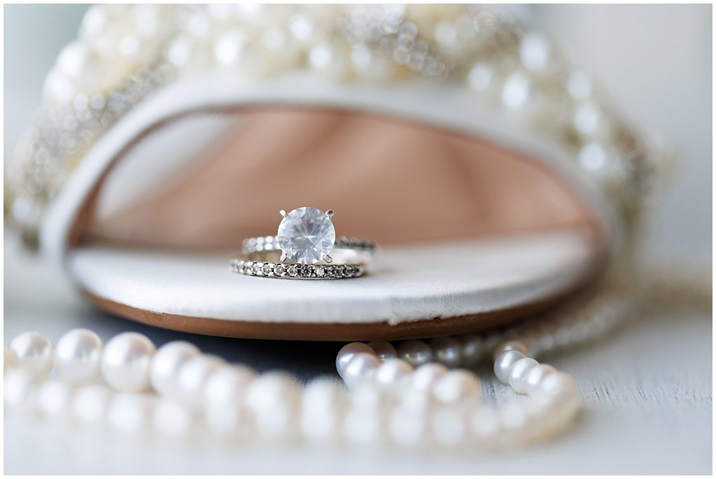 beautiful ring detail shot on brides shoe by simply grace photography in Denver