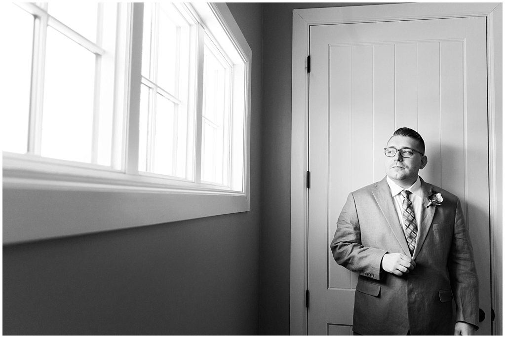 groom portraits at the barn of raccoon creek