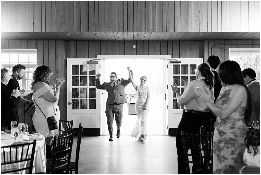 reception entrance with bride and groom