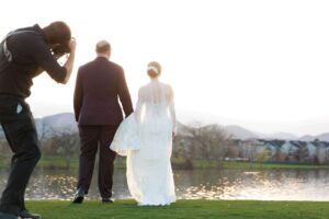 wedding photographer in colorado during golden hour with the bride and groom